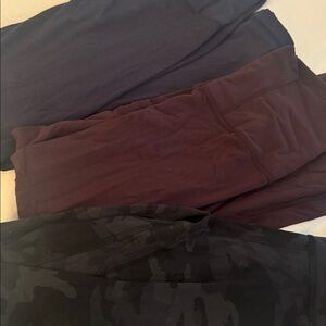 FIVE pairs of Lulu lemon align leggings size 2. Navy, black, camo, etc